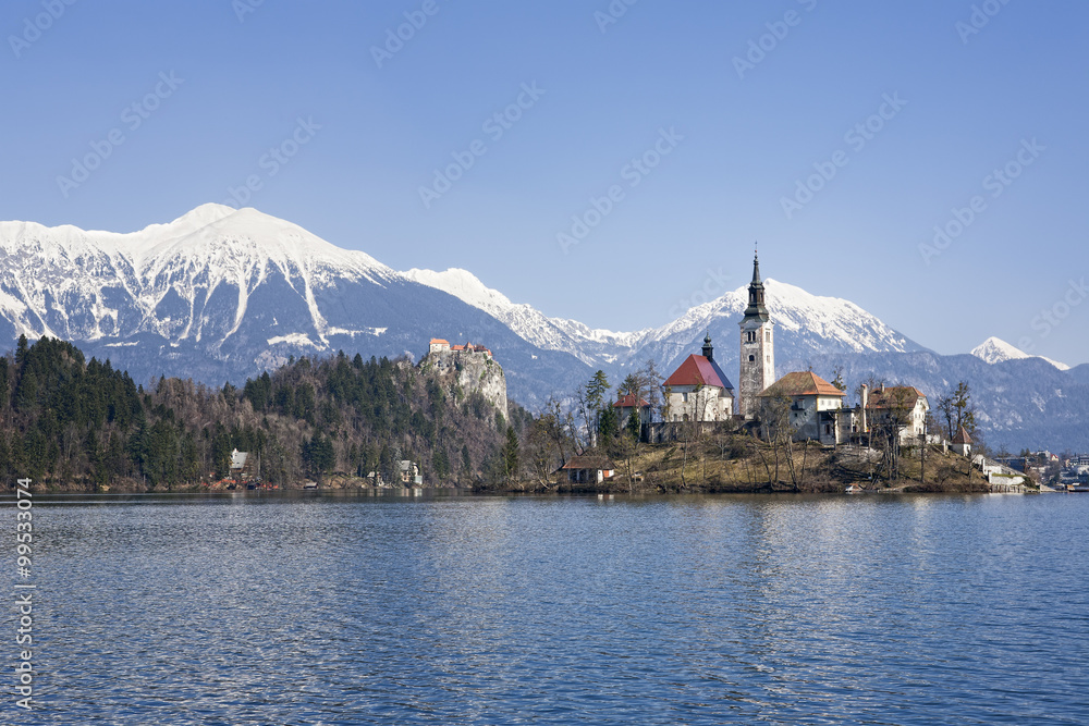 View of Karavanke mountains and lake Bled with St. Marys Church of the Assumption on the small island; Bled, Slovenia, Europe. View of Karavanke mountains and lake Bled with St. Marys Church of the Assumption on the small island; Bled, Slovenia, Europe.