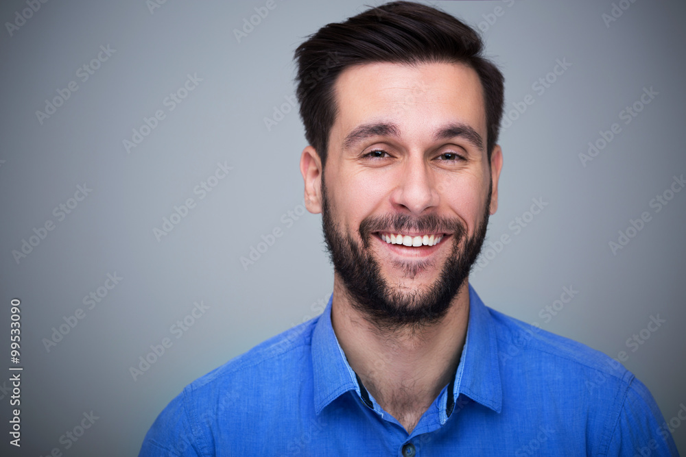 Young man smiling
Young man smiling