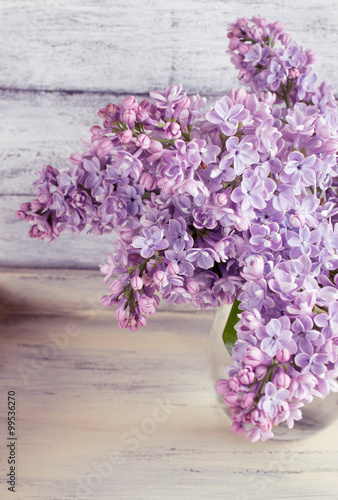 Fototapeta Naklejka Na Ścianę i Meble -  Lilac flowers in a bottle