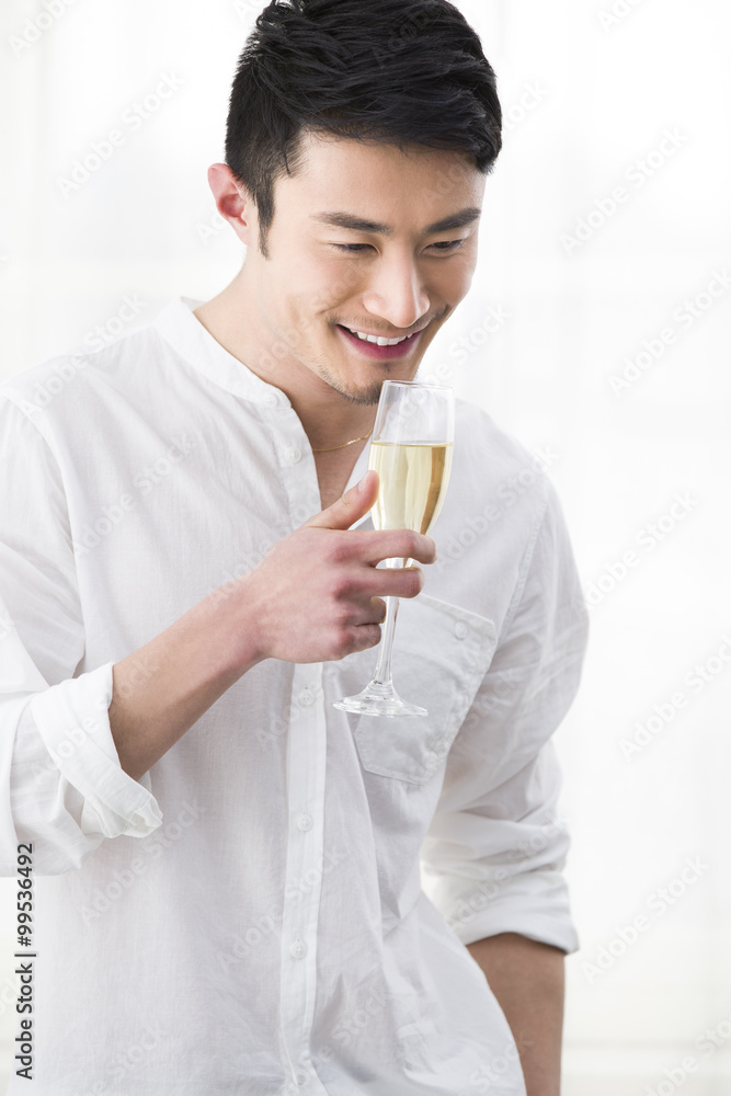 Happy young man with champagne Happy young man with champagne