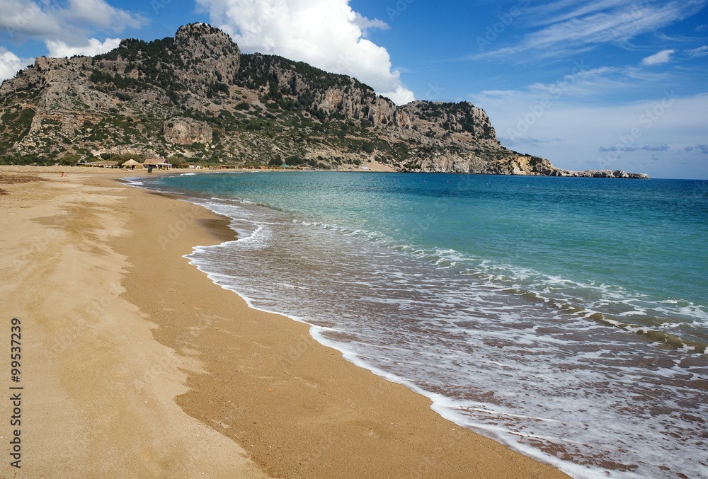 Tsambika (or Tsampika) is one of the most beautiful beaches on Rhodes, Greece. A long, broad beach with fine, golden sand. Very crowded at summer period.