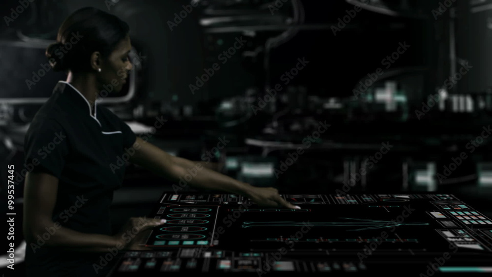 African American female using table touch screen technology in futuristic office African American female using table touch screen technology in futuristic office