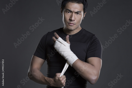 Boxer wrapping hands