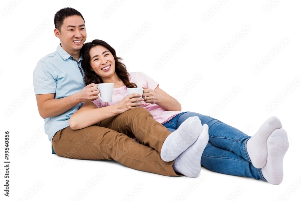 Full length happy young couple with cup Full length happy young couple with cup