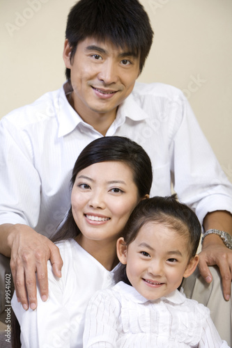 Portrait of a family of three © Blue Jean Images