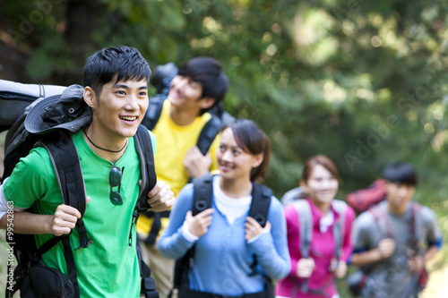 Young people go hiking in mountain