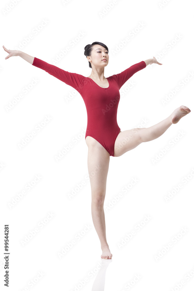 Female gymnast performing rhythmic gymnastics