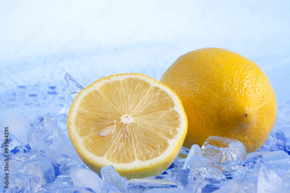 Fresh lemon and ice cubes Fresh lemon and ice cubes