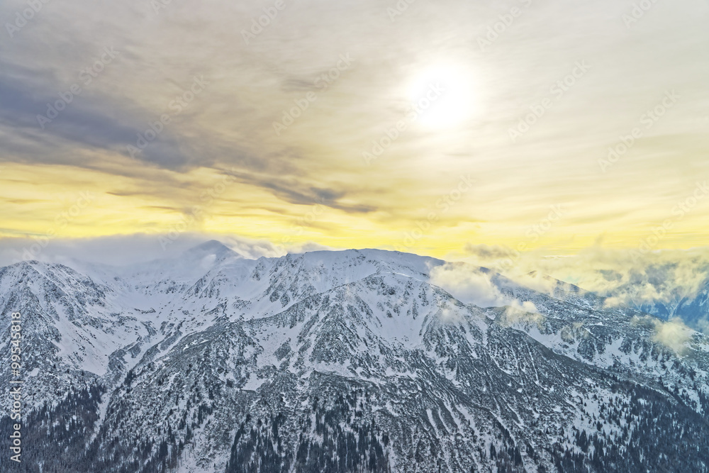 Sunset at Kasprowy Wierch peak in Zakopane in Tatras in winter