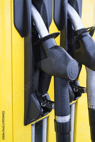 gun fuel pump at a gas station
