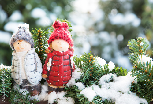 Two ceramic dolls at snow © Вадим Сирота
