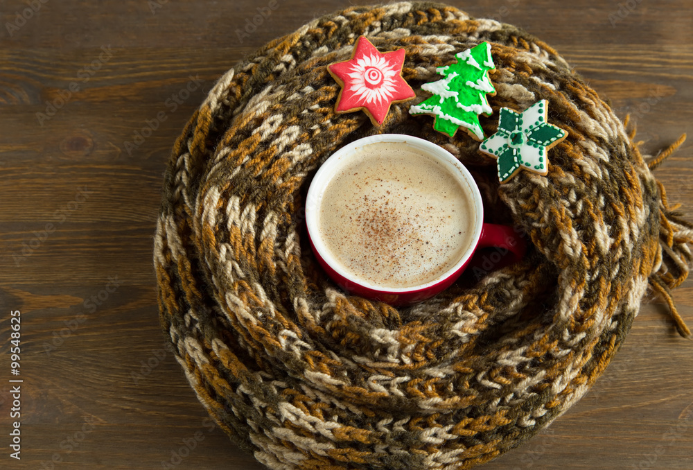 A cup of coffee in a scarf, new year theme, A cup of coffee in a scarf, new year theme,