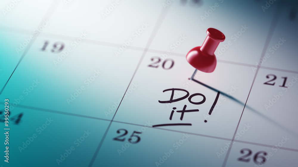 Concept image of a Calendar with a red push pin. Closeup shot of Concept image of a Calendar with a red push pin. Closeup shot of