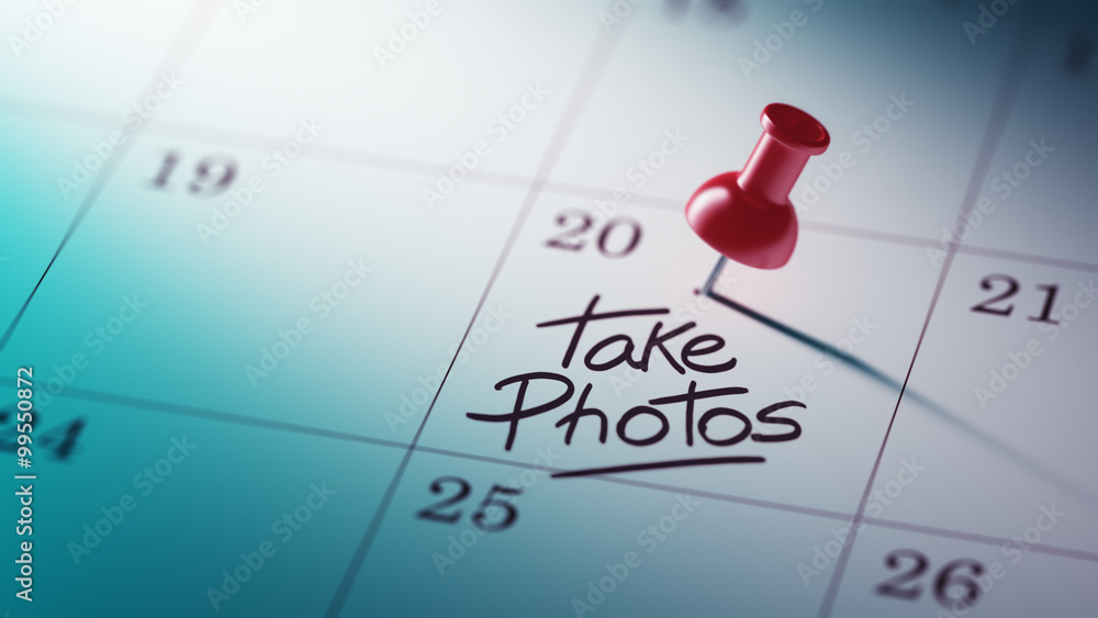 Concept image of a Calendar with a red push pin. Closeup shot of Concept image of a Calendar with a red push pin. Closeup shot of