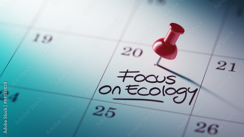 Concept image of a Calendar with a red push pin. Closeup shot of Concept image of a Calendar with a red push pin. Closeup shot of