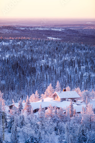 Wallpaper Mural Winter scenery view over a cabin in frozen forest. Torontodigital.ca