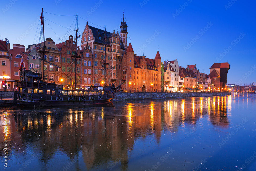 The old town of Gdansk at frozen Motlawa river, Poland