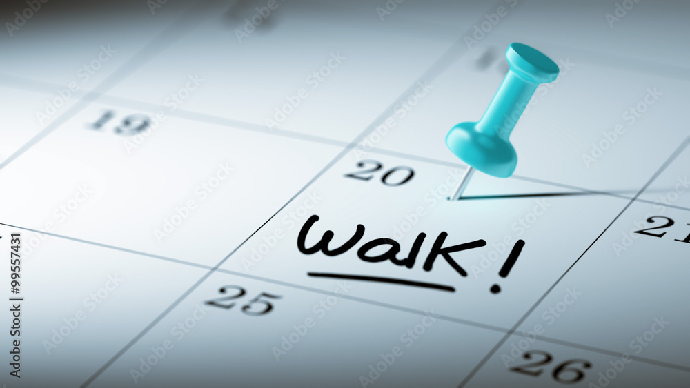 Concept image of a Calendar with a blue push pin. Closeup shot o Concept image of a Calendar with a blue push pin. Closeup shot o