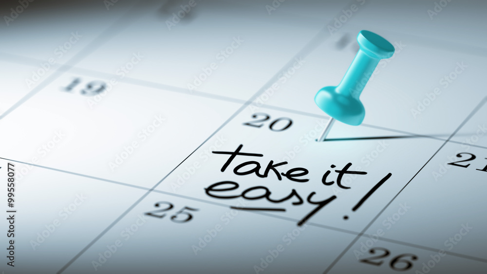 Concept image of a Calendar with a blue push pin. Closeup shot o Concept image of a Calendar with a blue push pin. Closeup shot o