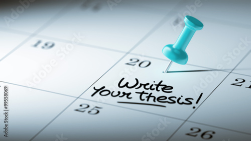 Concept image of a Calendar with a blue push pin. Closeup shot o