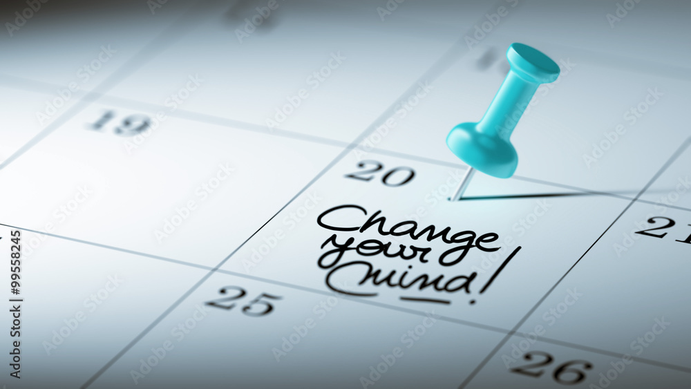 Concept image of a Calendar with a blue push pin. Closeup shot o Concept image of a Calendar with a blue push pin. Closeup shot o