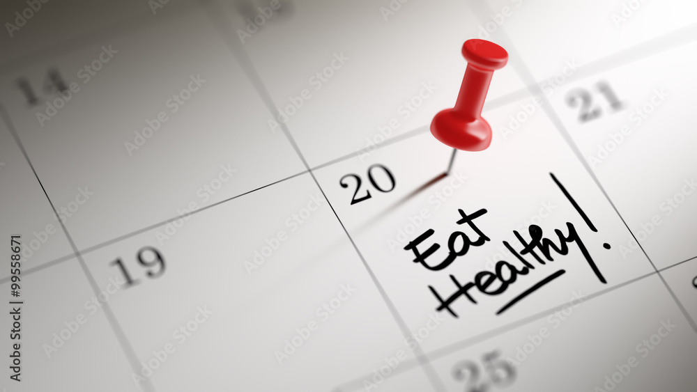 Concept image of a Calendar with a red push pin. Closeup shot of Concept image of a Calendar with a red push pin. Closeup shot of