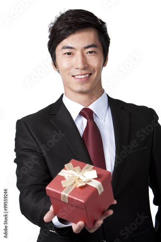 Businessman Holding a Gift
