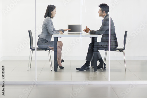 Business person talking in meeting room