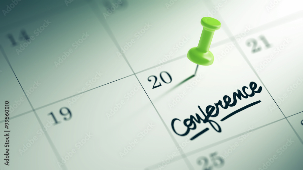Concept image of a Calendar with a green push pin. Closeup shot Concept image of a Calendar with a green push pin. Closeup shot