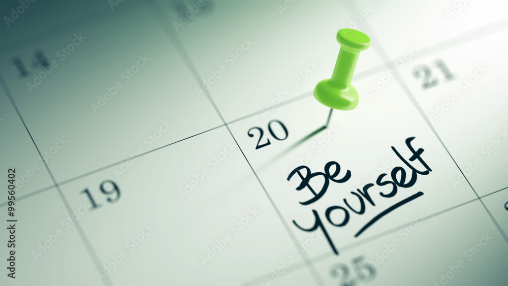 Concept image of a Calendar with a green push pin. Closeup shot Concept image of a Calendar with a green push pin. Closeup shot