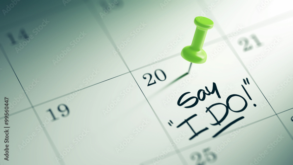 Concept image of a Calendar with a green push pin. Closeup shot Concept image of a Calendar with a green push pin. Closeup shot