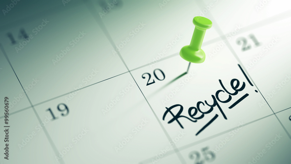 Concept image of a Calendar with a green push pin. Closeup shot Concept image of a Calendar with a green push pin. Closeup shot