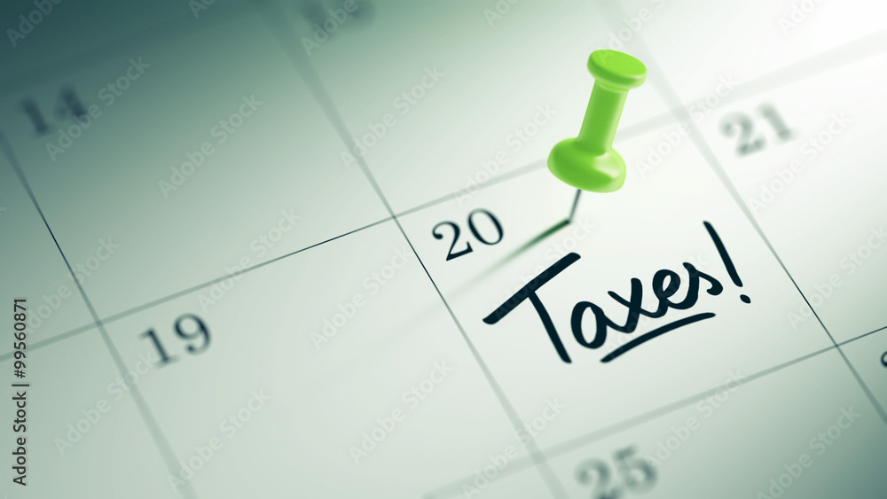 Concept image of a Calendar with a green push pin. Closeup shot Concept image of a Calendar with a green push pin. Closeup shot