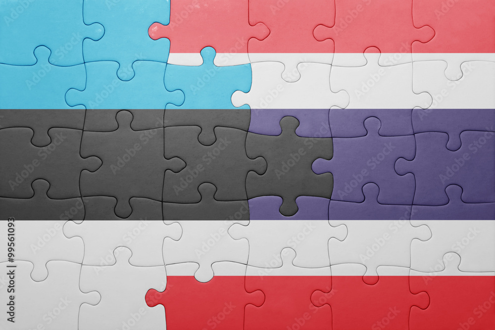 Fototapeta premium puzzle with the national flag of estonia and thailand