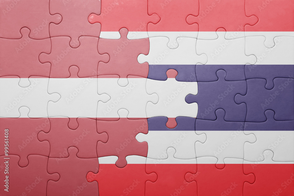 Fototapeta premium puzzle with the national flag of latvia and thailand
