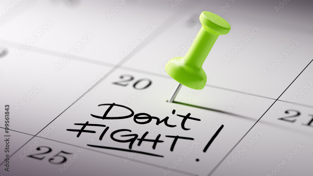 Concept image of a Calendar with a green push pin. Closeup shot