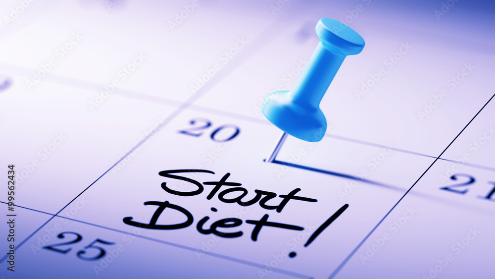 Concept image of a Calendar with a blue push pin. Closeup shot o Concept image of a Calendar with a blue push pin. Closeup shot o