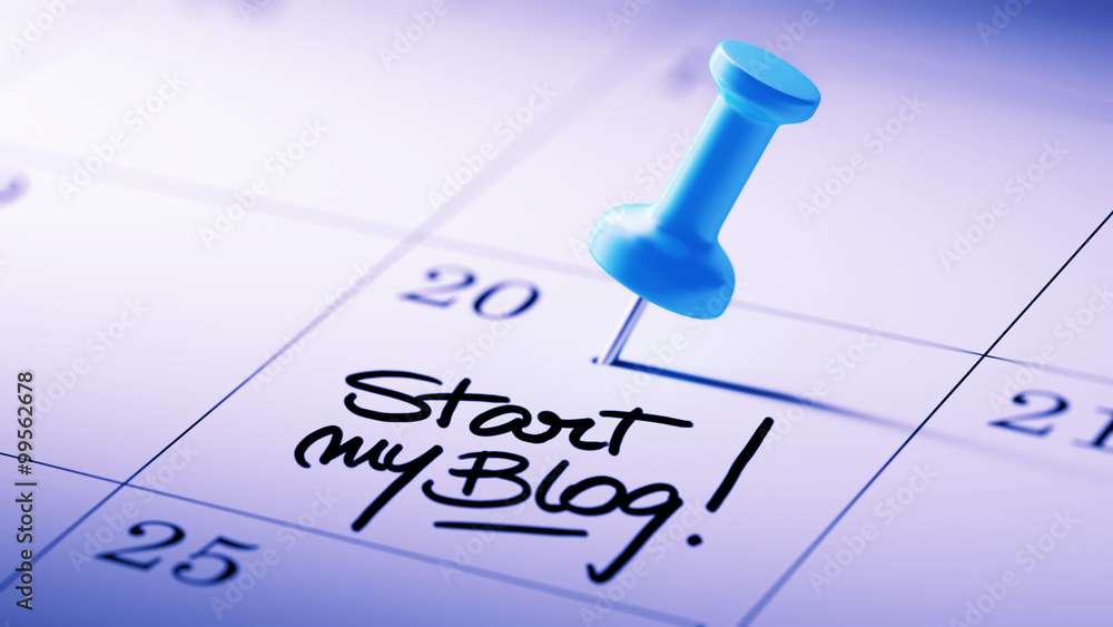 Concept image of a Calendar with a blue push pin. Closeup shot o Concept image of a Calendar with a blue push pin. Closeup shot o