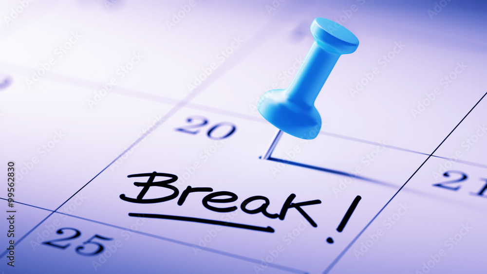 Concept image of a Calendar with a blue push pin. Closeup shot o Concept image of a Calendar with a blue push pin. Closeup shot o
