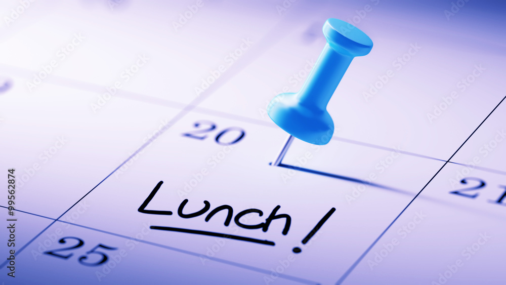 Concept image of a Calendar with a blue push pin. Closeup shot o Concept image of a Calendar with a blue push pin. Closeup shot o