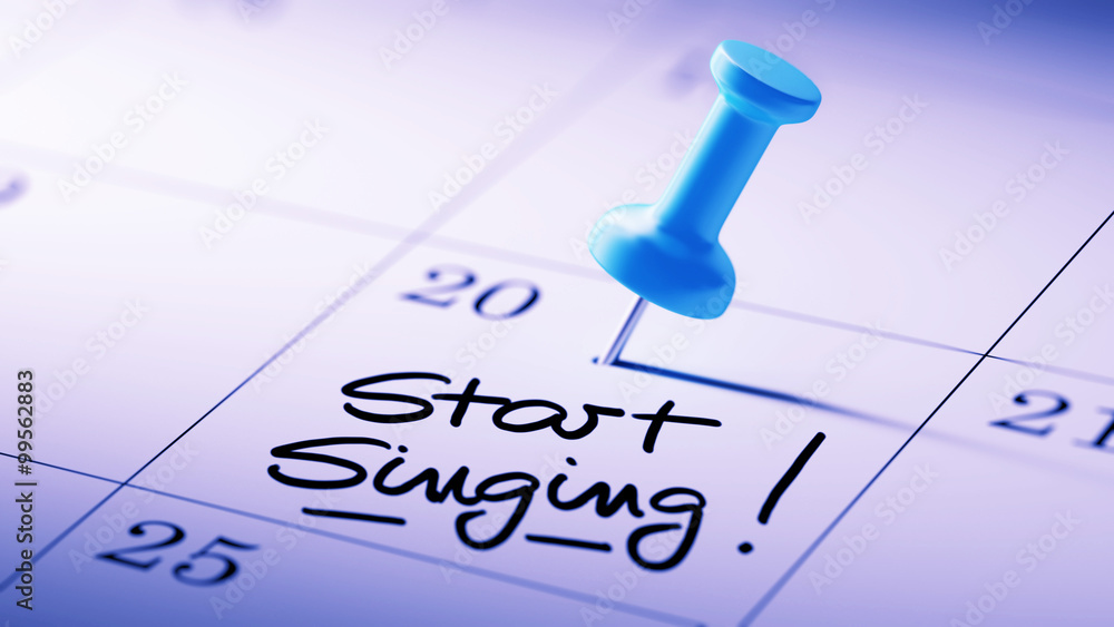 Concept image of a Calendar with a blue push pin. Closeup shot o Concept image of a Calendar with a blue push pin. Closeup shot o