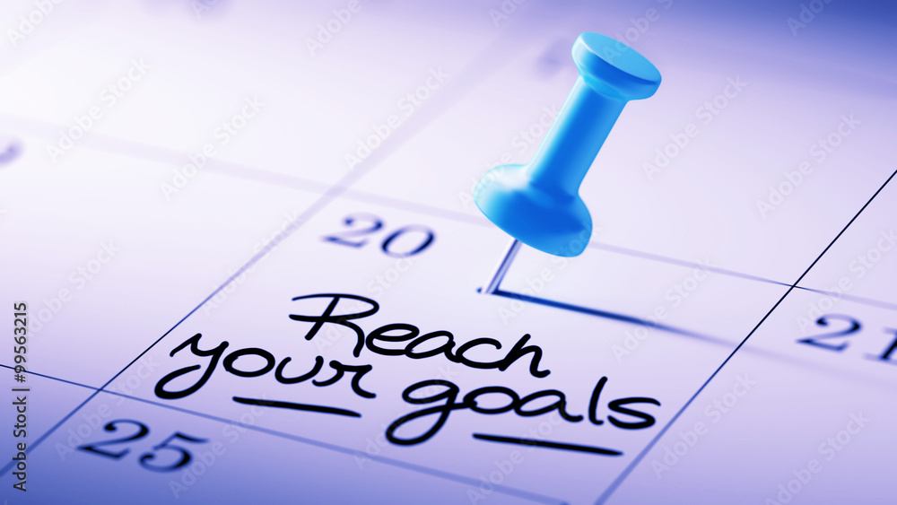 Concept image of a Calendar with a blue push pin. Closeup shot o Concept image of a Calendar with a blue push pin. Closeup shot o