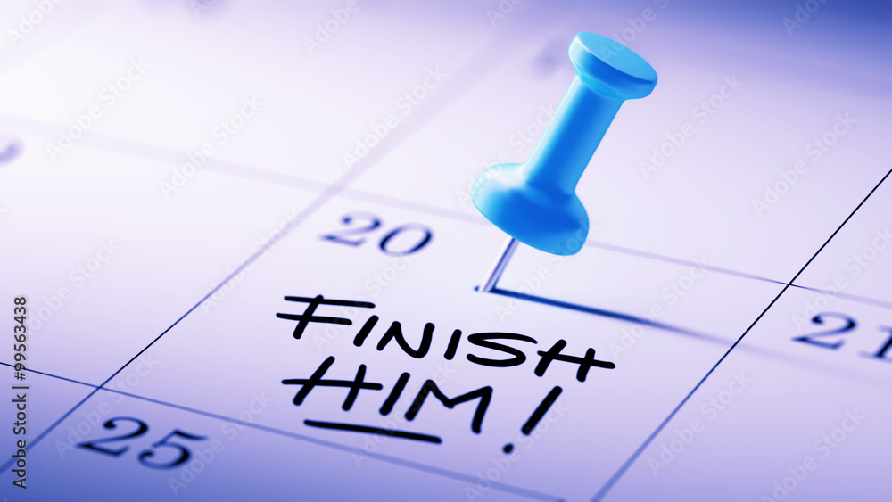 Concept image of a Calendar with a blue push pin. Closeup shot o