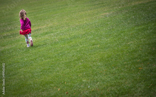 Girl running on the grass © Pav-Pro Photography 