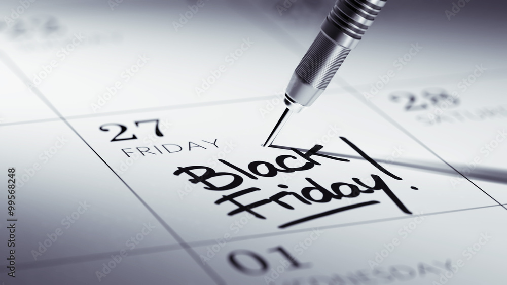 Concept image of a Calendar with a golden dart stick.. The words Concept image of a Calendar with a golden dart stick.. The words