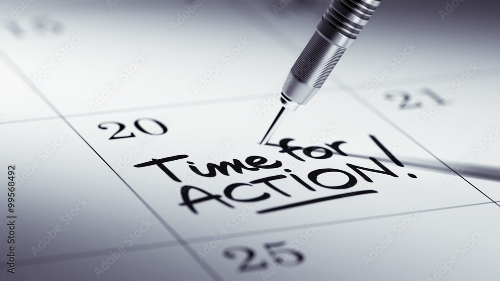 Concept image of a Calendar with a golden dart stick.. The words Concept image of a Calendar with a golden dart stick.. The words