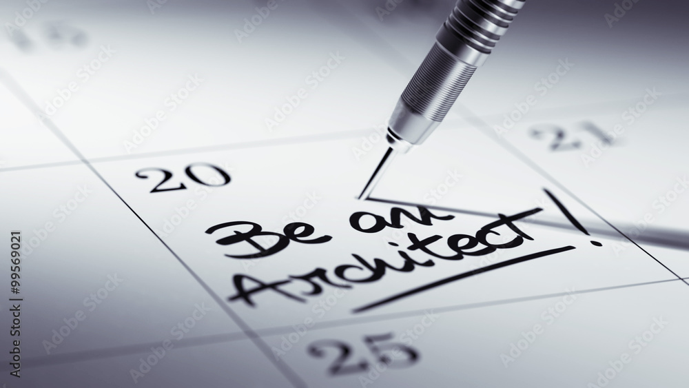 Concept image of a Calendar with a golden dart stick.. The words Concept image of a Calendar with a golden dart stick.. The words