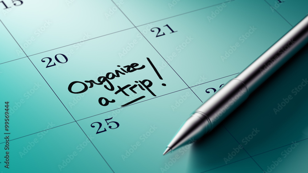 Closeup of a personal agenda setting an important date written w Closeup of a personal agenda setting an important date written w