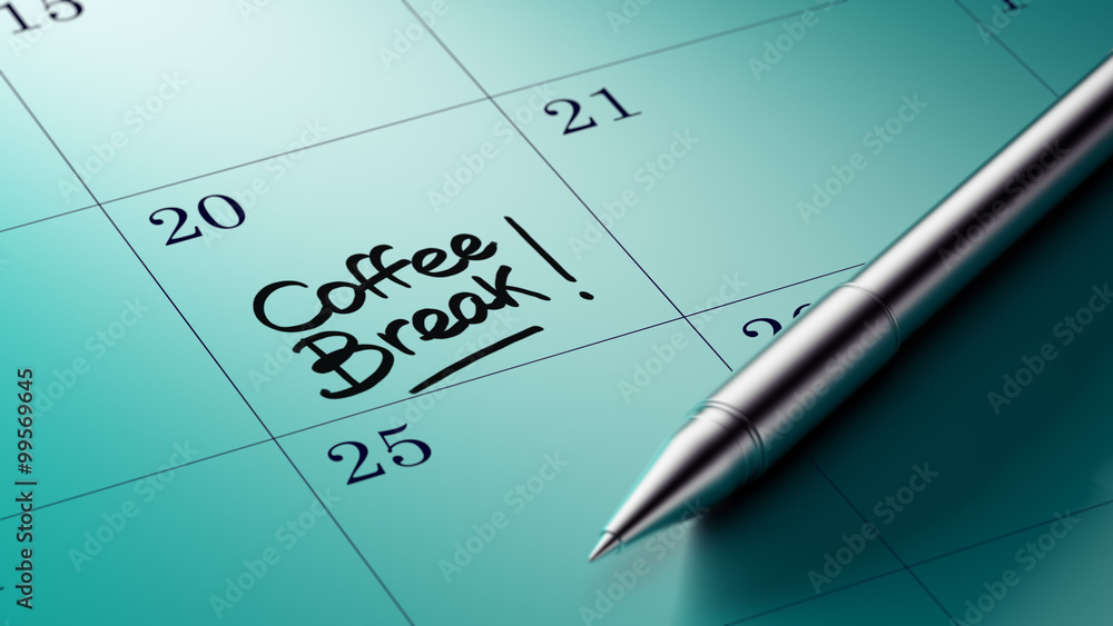 Closeup of a personal agenda setting an important date written w Closeup of a personal agenda setting an important date written w