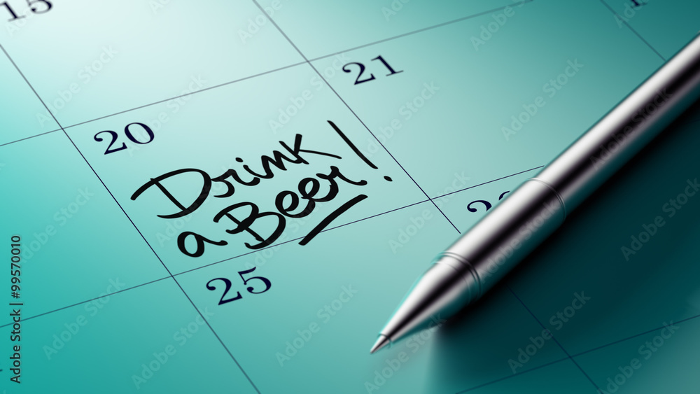 Closeup of a personal agenda setting an important date written w Closeup of a personal agenda setting an important date written w